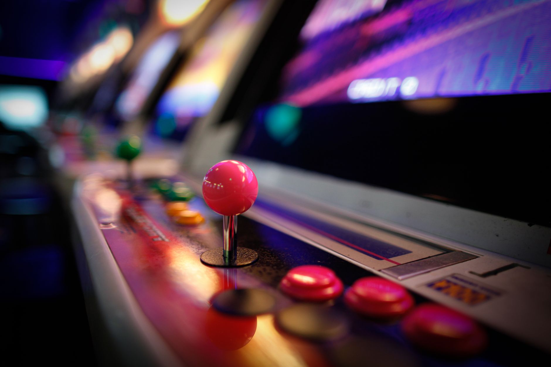 vibrant retro arcade machine with joysticks and buttons